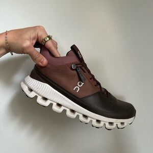 On Running Brown and White Athletic Shoes with Cloud-Like Sole